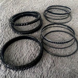 SOLD.  set of 10 black metal bangle bracelets